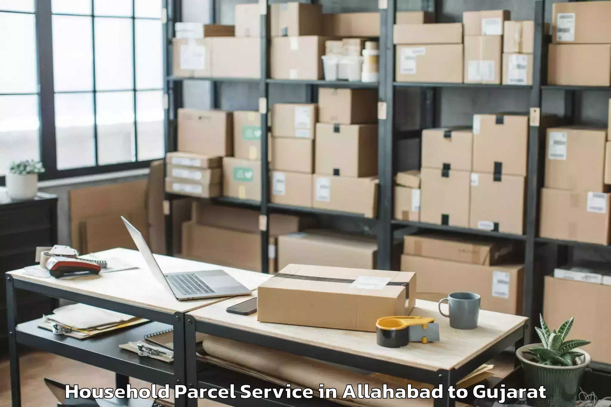 Allahabad to Kamdhenu University Gandhinaga Household Parcel Booking